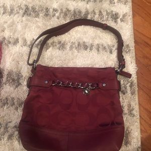 Maroon coach purse used in great condition